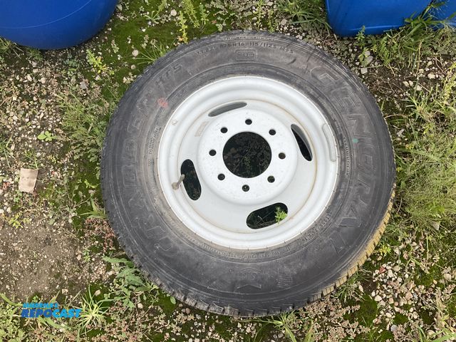 Lot 2-27884 - General tire and wheel. 8 bolt. LT225/75 R 16.
