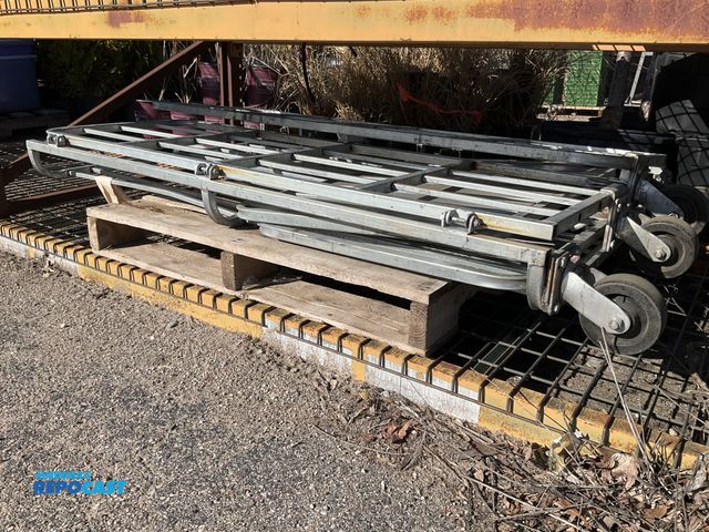 Lot 2-73238 - Rollable and collapsible metal prairie farms metal racking cages