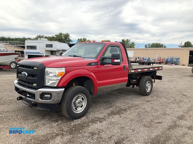 Lot 2-40805 - 2011 Ford F-350 Regular Cab Flatbed Truck 4WD