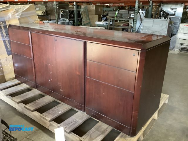 Lot 2-76669 - Multidrawered red wood desk Crenshaw with locking drawers approx. 71” x 24” x 30”
