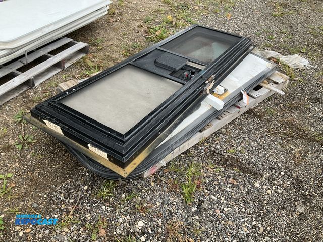 Lot 2-41631 - (2) RV/Camper doors, one is approx 24” x 76” and the other is approx 24” x 80”, scattered scratches ...