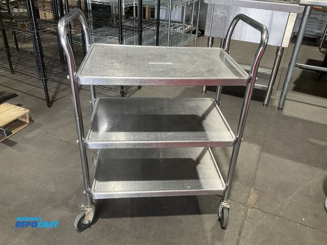Lot 2-55129 - Vollrath model 97105 stainless steel 3-Tier service cart.  Total unit dimensions: 27.5” length x 29....
