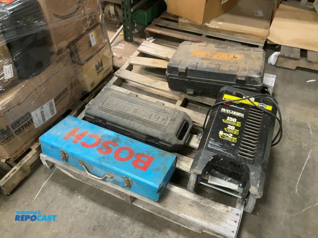 Lot 2-18594 - Skid lot of various tools including a Bosch 120V reciprocating saw, battery charger, and more