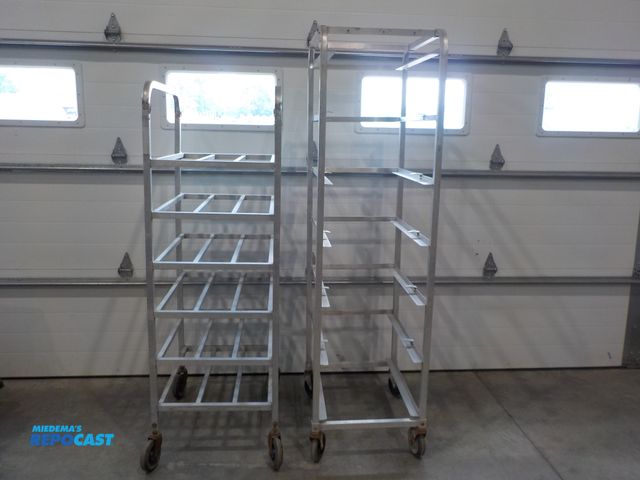 Lot 2-30266 - Lot of (2) aluminum rolling storage racks. See pics for measurements.