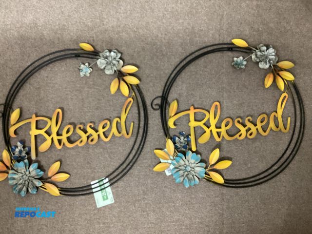 Lot 2-76417 - Two new Blessed metal art farmhouse wall decor. Measures approximately 17-1/2” across.
