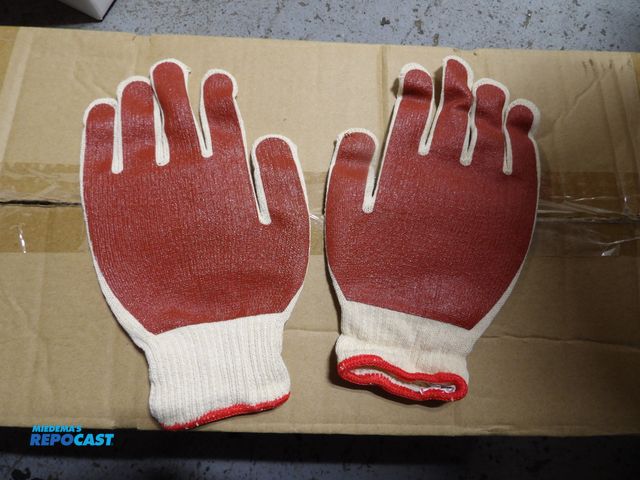 Lot 2-53223 - New lot of (144) pairs of new string knit gloves, palm coated, 4NGZ4