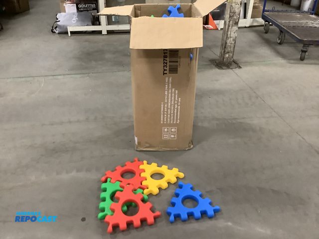 Lot 2-65753 - Box of triangular plastic puzzle pieces multi colored 12” long 1 1/2” thick