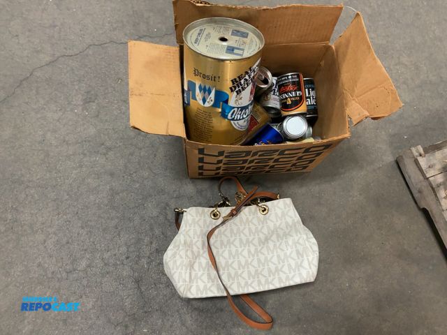 Lot 2-67367 - Michael kors purse and vintage beer cans