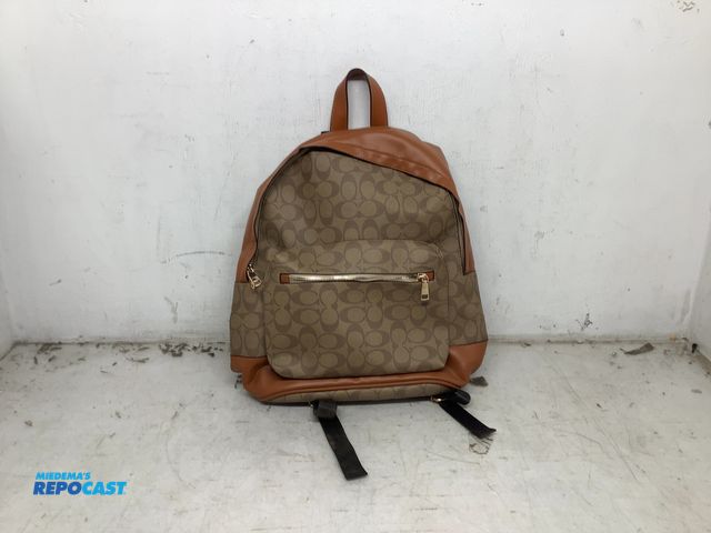 Lot 2-74016 - New Coach signature Charlie backpack featuring a khaki canvas body with signature monogramming and s...