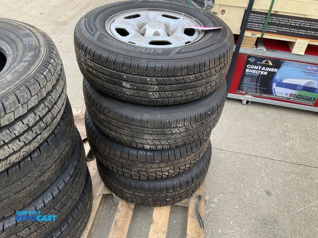 Lot 2-21172 - (4) 215/70R15 tires on Toyota steel 5-bolt wheels, used, two different style tires