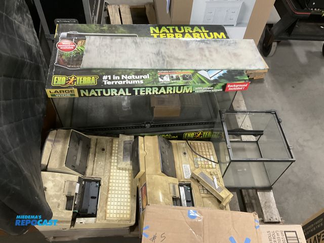 Lot 2-67070 - Skid lot of misc. includes: (2) old cash registers, glass box, large 36” x 18” x 18” natural terrari...