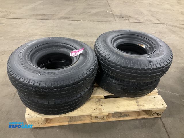 Lot 2-23915 - (4) 8-14.5 tires on steel mobile home style wheels, used