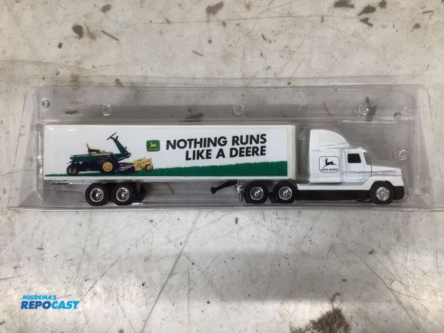 Lot 2-92056 - Die cast John Deere truck and trailer model
