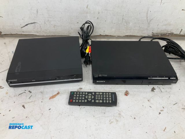 Lot 2-92277 - Lot includes: Sony DVP-SR510H CD/DVD Player ~AC 120V 60Hz 6W, SYLVANIA SDVD1046 DVD Player 15W, &amp...