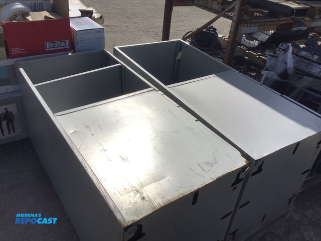 Lot 2-94937 - Metal Skid lot of (2) gray Metal cabinets 2 shelves and 1 locker 3 drawers 1 of the cabinets the dra...