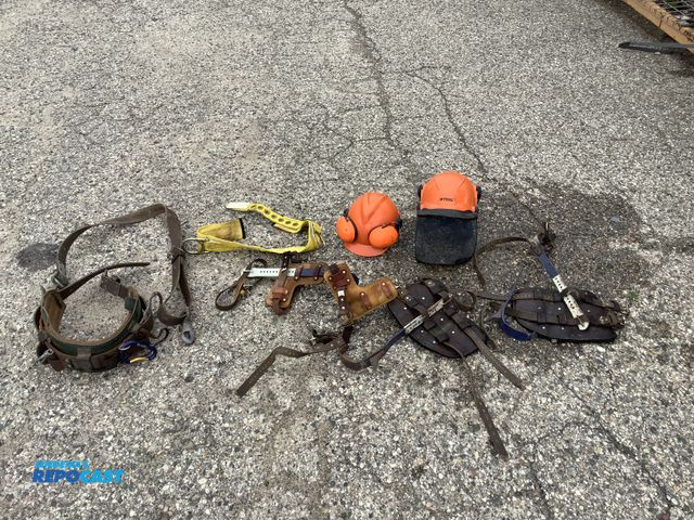 Lot 2-93420 - Lot of Tree Climbing Gear Including 4-Belts, Some with Tools, and (2) Hard Hats with Headphones