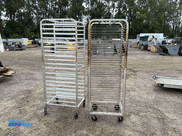 Lot 2-27268 - Lot of (2) metal rolling tray bakery carts - approx. 20.5” x 24” x 68” and 20” x 26” x 69.5”