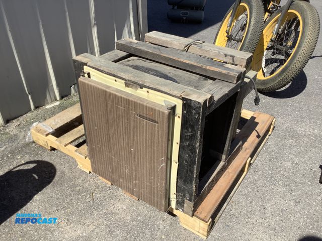 Lot 2-76685 - Norcold mini industrial refrigerator with wooden build in box around it (25” x 22” x 23”)