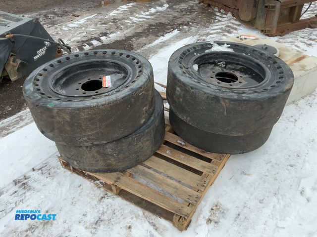 Lot 2-42419 - (4) Used Camso Size 33x12-20 Solid Rubber Skid Steer Tires/Wheels, 8 on 8” bolt pattern