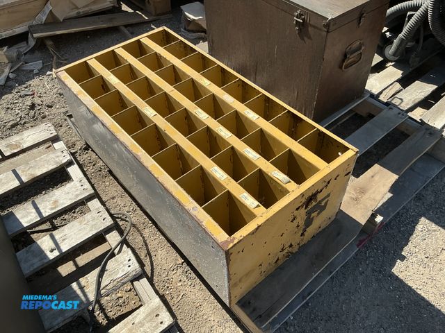 Lot 2-76749 - Metal Yellow cabinet/shelf organizer with 32 slots approximately 35” x 12” x 17”