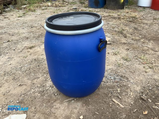 Lot 2-62990 - lot of (1) 25 gallon blue plastic barrel with 2 removable lid and locking ring. clean inside. contai...