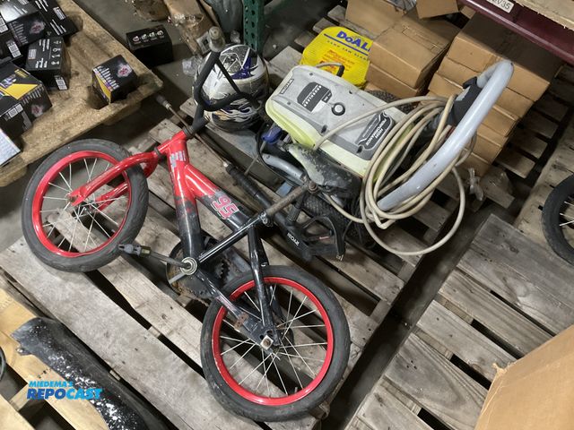 Lot 2-67885 - Skid lot includes a kids bicycle, a xs dirtbike helmet, and a Ryobi electric pressure washer with au...