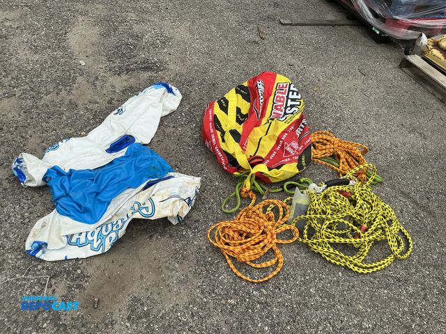Lot 2-99506 - Lot of various tubing equipment including ropes, aqua buddy tube, and a wable booster
