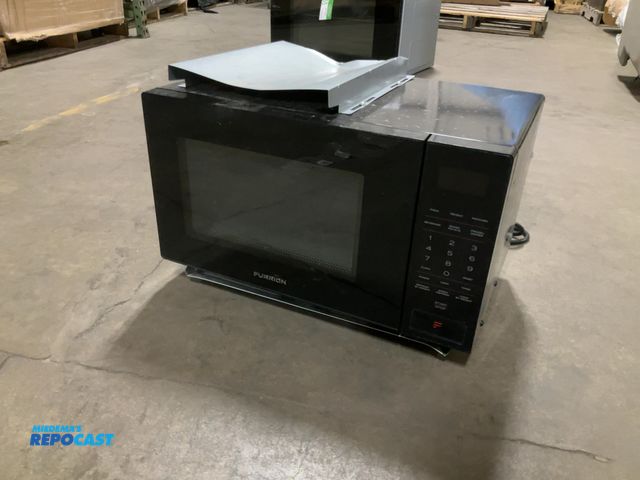 Lot 2-61956 - RV furrion Microwave oven FMSN09-BL - Scratch &amp; Dent - has large dent on top