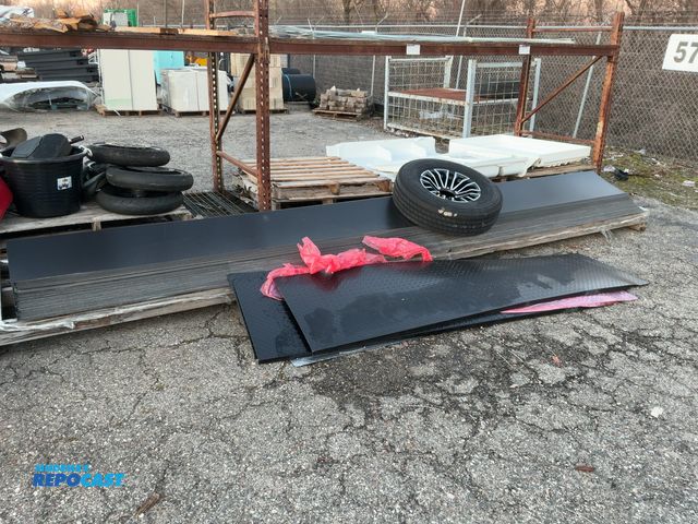 Lot 2-93706 - Skid slot of Miscellaneous Black Metal Skirts Approximately 15 Feet Long
