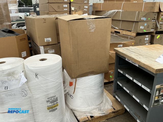 Lot 2-24724 - Box of white spunbond bags (1oz X 18” X 28”), and a roll of white polymer packaging, 21” wide