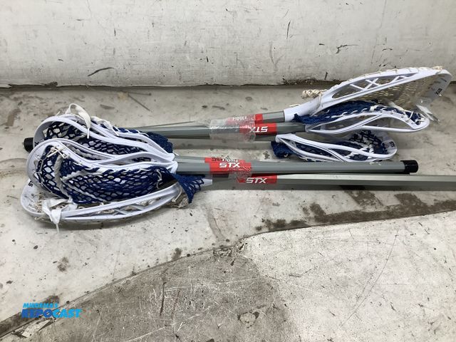 Lot 2-27966 - Fiddlestx lacrosse stick (4) small sticks (2) goalie sticks with net