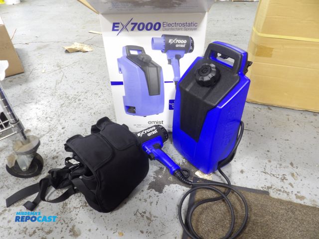 Lot 2-53859 - New in box Emist EX7000 w / backpack disinfectant sprayer, harness, 2 batteries, charger, and traini...