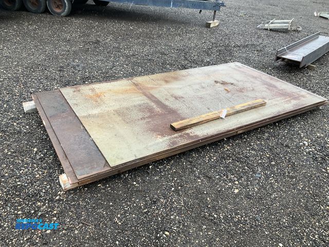 Lot 2-40702 - (4) 1/2” x 5’ x 10’ steel sheets, (1) 3/8” x 5’ x 10’ steel sheet, and (1) 3/8” x 5’ 9’ steel sheet