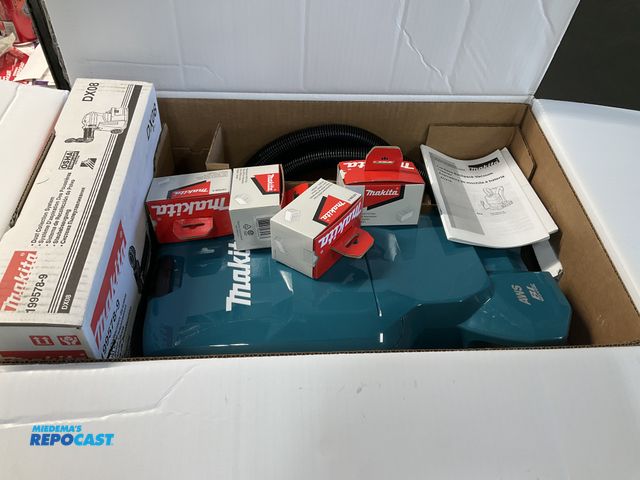 Lot 2-76888 - Makita XCV18ZX Backpack Vacuum with extra Dust Collectors and Filters