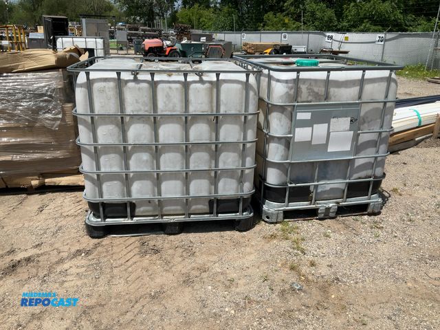 Lot 2-10799 - Lot of (2) 250 gallon totes, previously used to collect rain water.