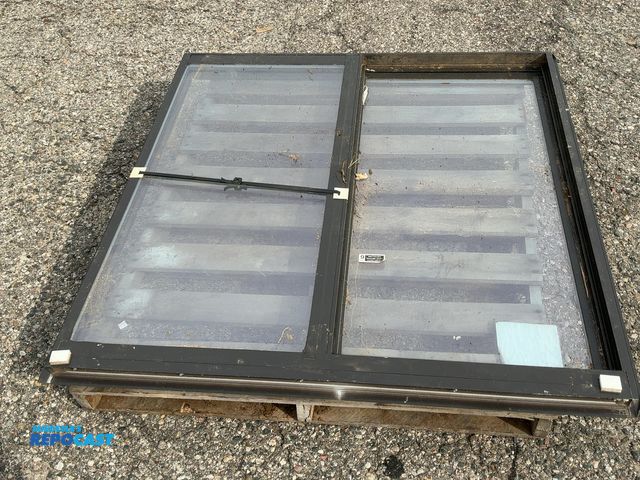 Lot 2-27249 - Aluminum frame double pane slide window. Rough opening. 46-1/2” x 46-5/8”.
