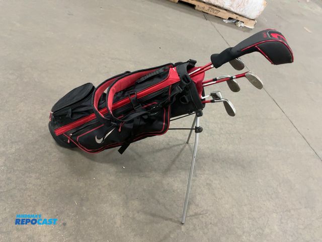 Lot 2-37047 - Nike VRS gold club set with Nike gold club bag