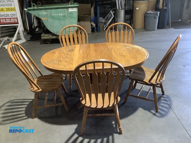 Lot 2-67640 - Skid lot of oval Wooden kitchen table with 5 matching chairs