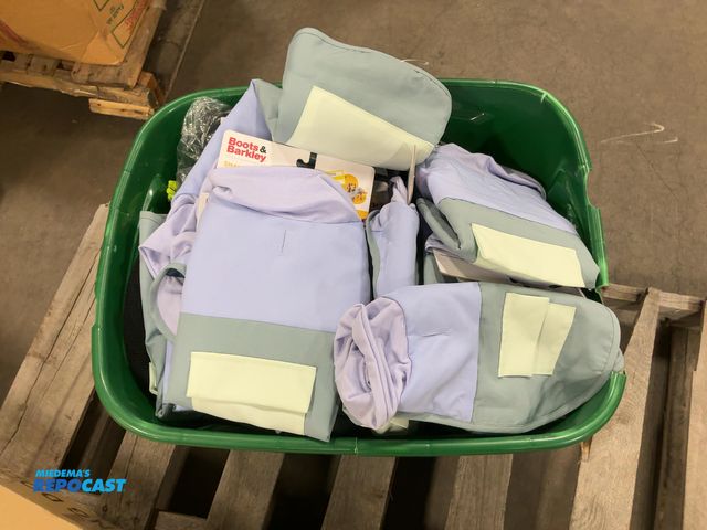 Lot 2-33585 - Tote of various pet vests/jackets.