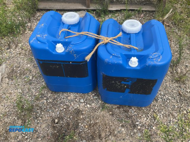 Lot 2-27257 - (2) 4 gal. blue plastic containers - clean inside