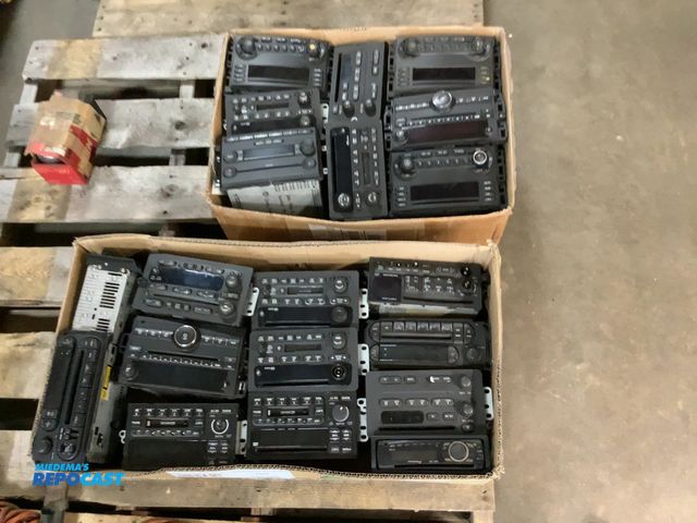 Lot 2-62001 - (2) boxes of automotive radio and CD control assemblies