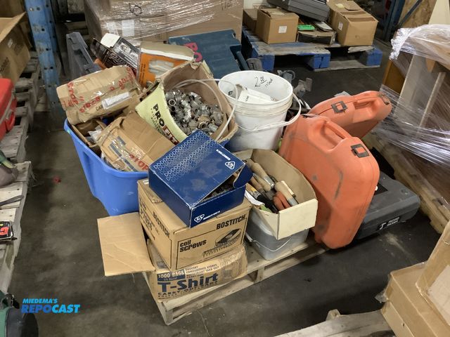 Lot 2-32694 - Skid lot of assorted items including: nail guns, screws,  ails, ring pliers, spiral saw, metal valve...