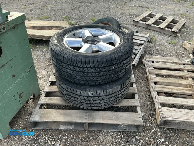 Lot 2-27661 - Pair of  wheels from a Chevy Tahoe GT Radial Savero HT2 tubeless tires with 6 lug nut chrome rims