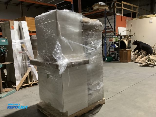 Lot 2-35798 - Skid lot of miscellaneous household items including: cupboards, mirrors, double sink with vanity… et...