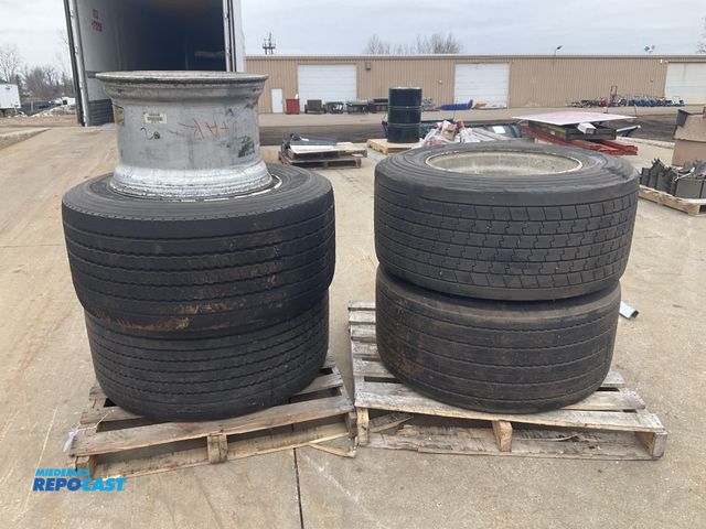 Lot 2-11572 - (4) 445/50R22.5 super singles on steel wheels and (1) 22.5 aluminum super single wheel, used