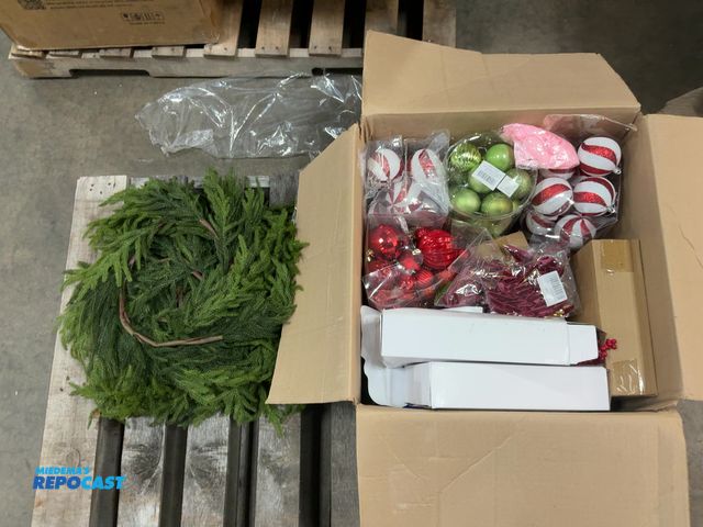 Lot 2-33590 - Lot of  Christmas decor. Includes ornaments, ribbon, etc.