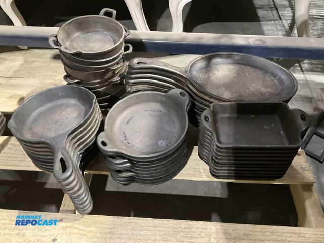Lot 2-55069 - Lot of cast iron cookware includes (10) Lodge 9” oval skillets with handle, (10) Lodge 6” round skil...