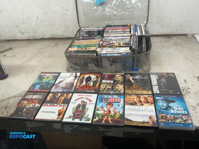 Lot 2-69438 - Bag of many DVD’s of various genres