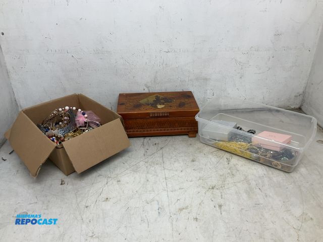 Lot 2-13392 - Lot of various jewelry including earrings, necklaces, watches, broaches, charms, etc
