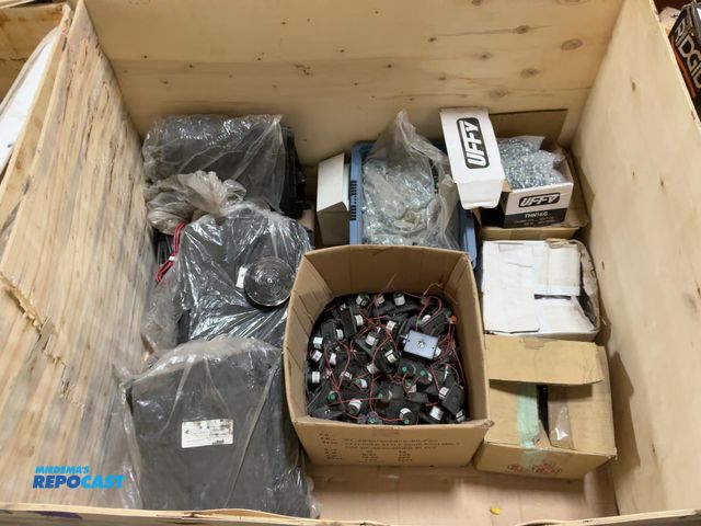 Lot 2-60451 - Crate of Miscellaneous Items Including Charging Outlets, Foam Tape Roll, Bolts, and More